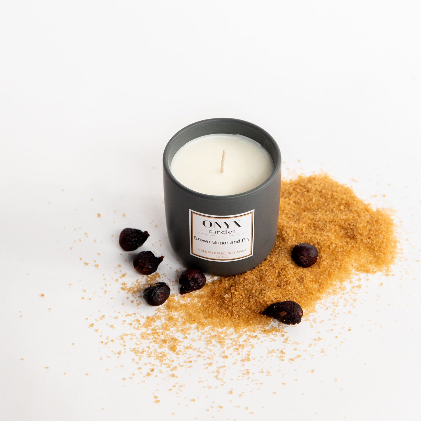 Pictured is the 12 oz matte black ceramic option, scented in Brown Sugar and Fig
