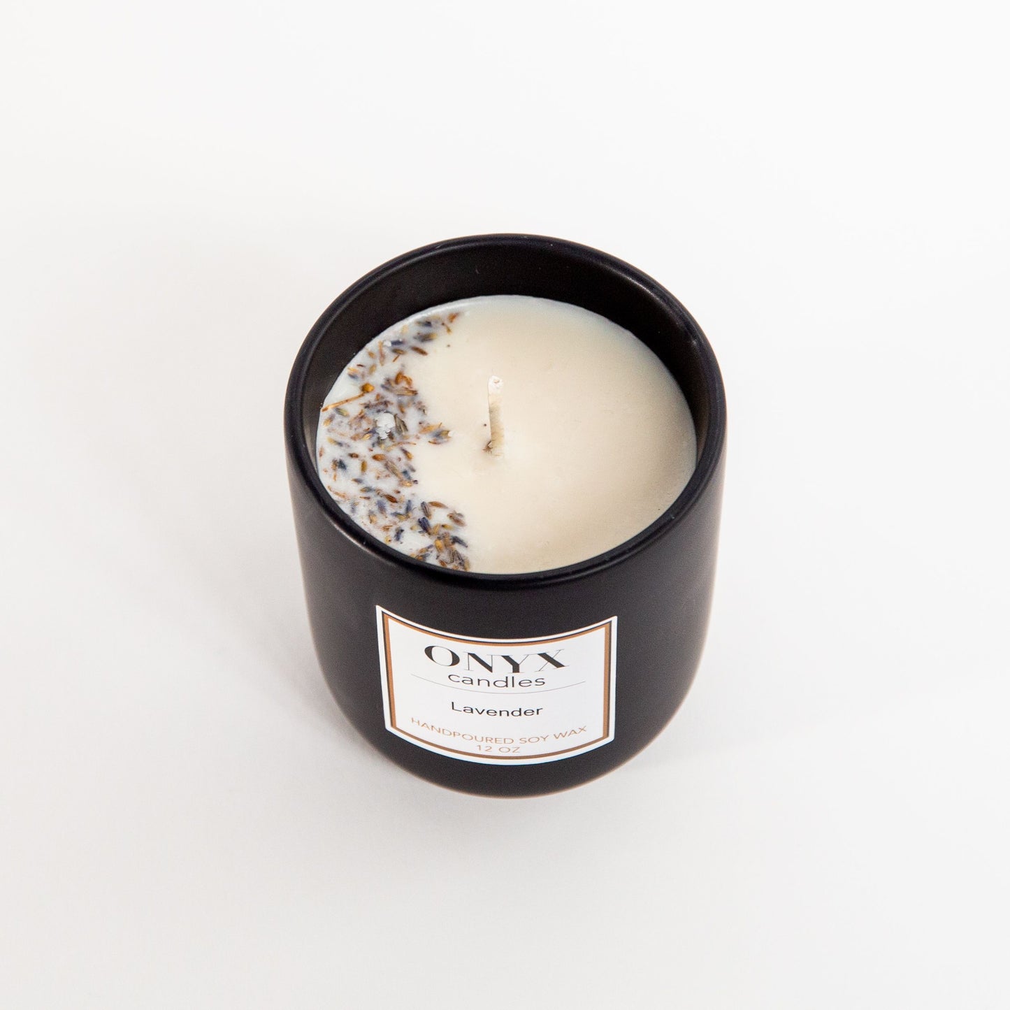 Lavender scented Onyx candle, view from above showing details of fresh lavender poured into the wax
