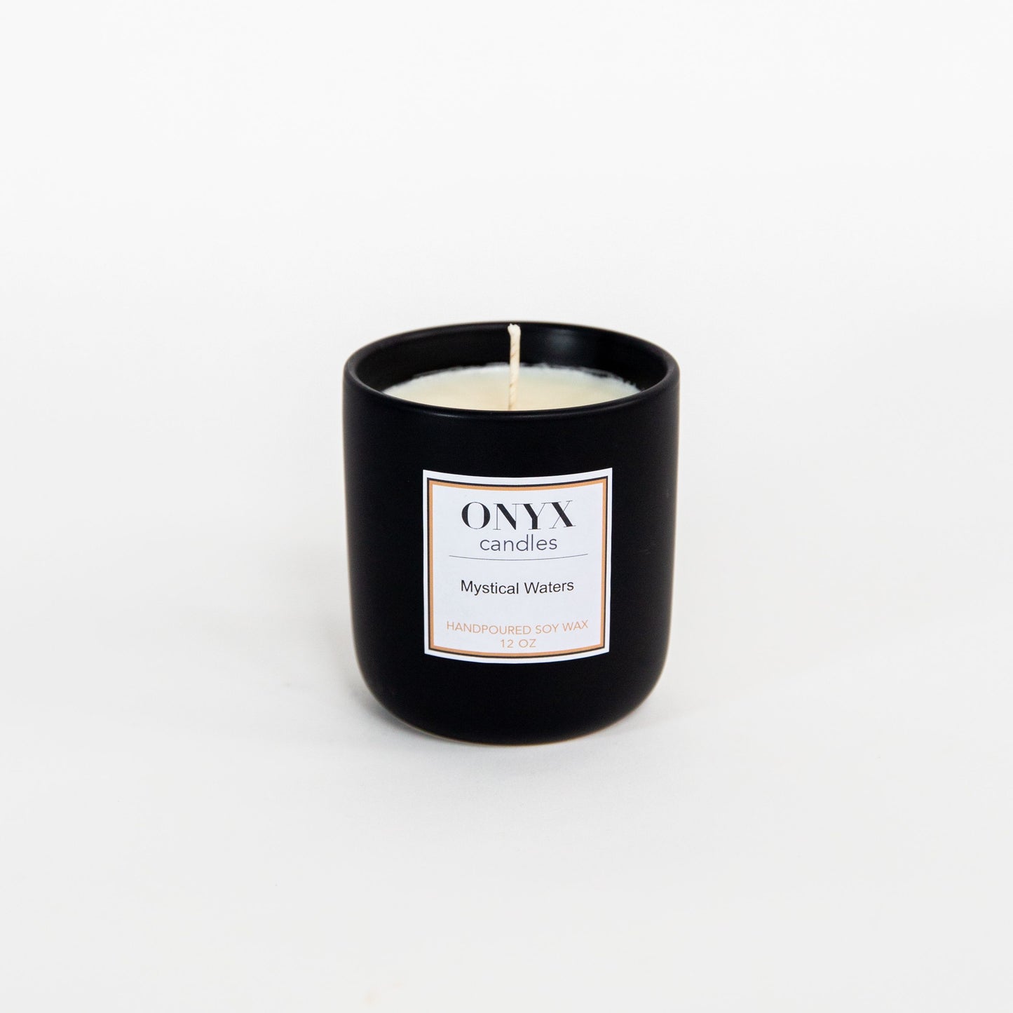 Mystical Waters in the 12 oz matte black ceramic jar