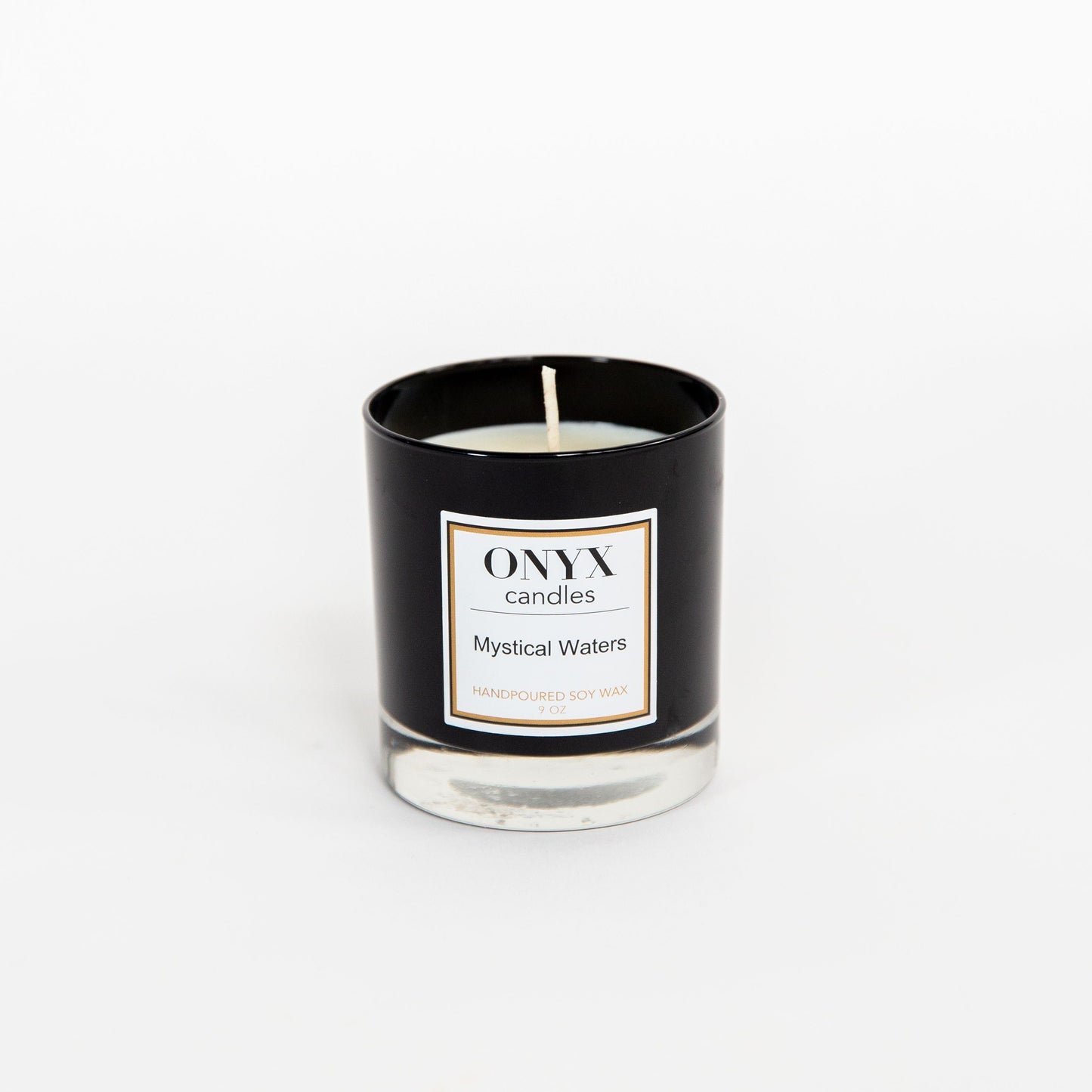 Mystical Waters candle in the 9 oz black glass jar