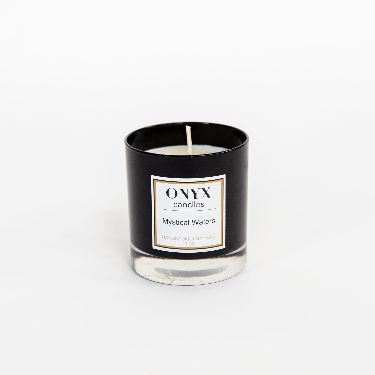 Mystical Waters candle in the 9 oz black glass jar