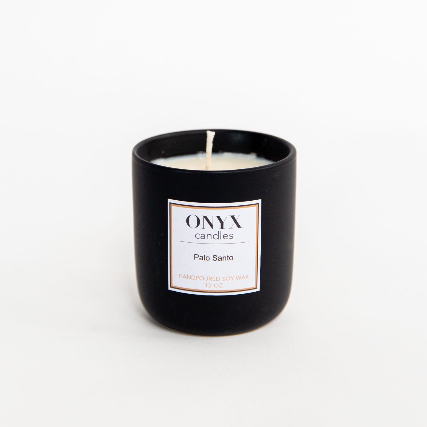 Palo Santo candle in the 12oz matte black ceramic jar