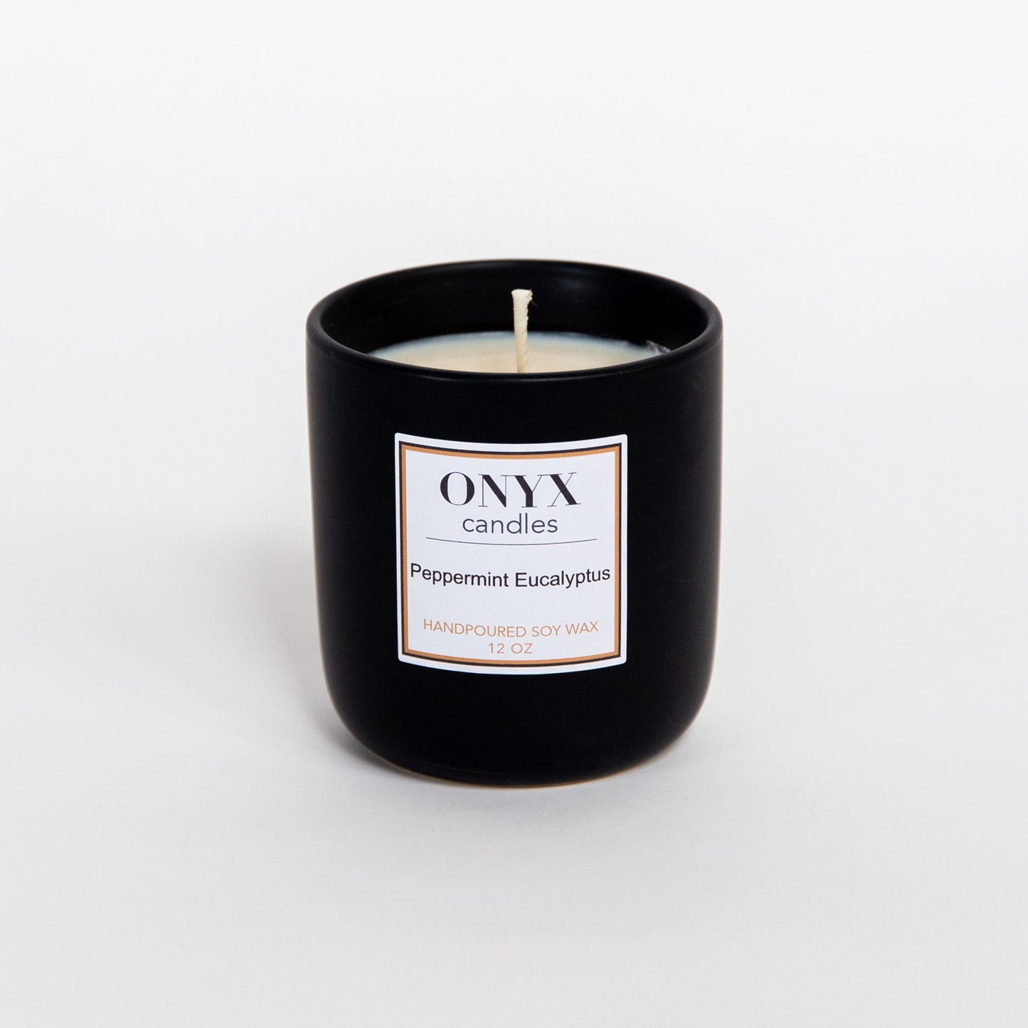 Shown here is the 12oz matte black ceramic jar option for the scent Peppermint Eucalyptus