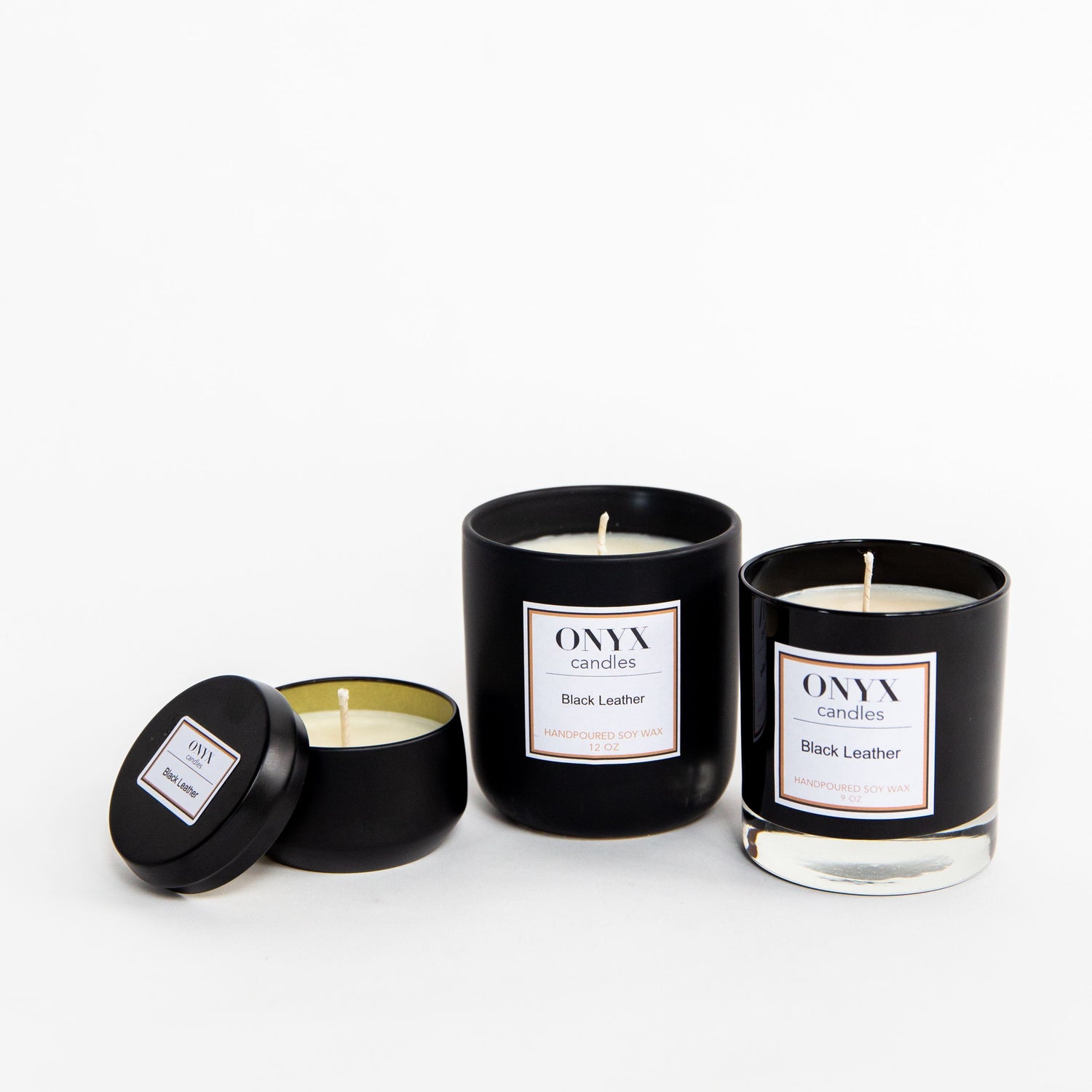 Pictured here are three size varieties of Onyx candles, in the scent Black Leather