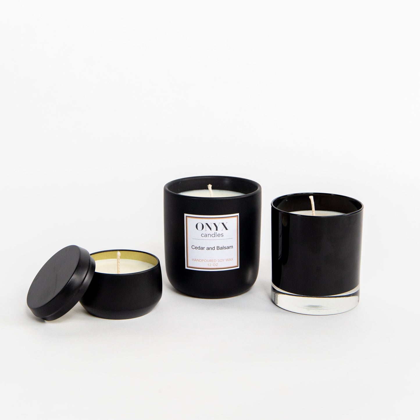 Pictured here are three size variations of Cedar and Balsam scented Onyx candles