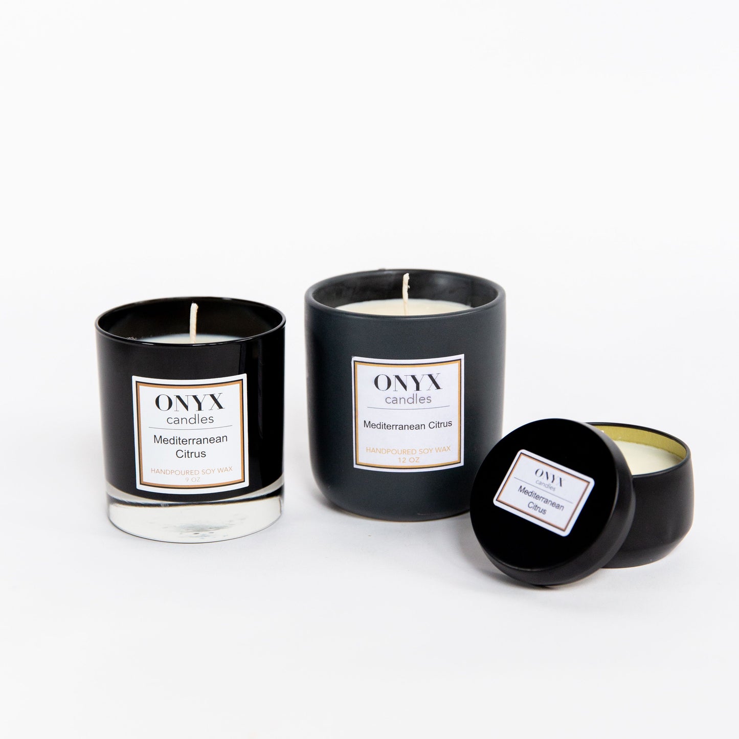 Three of the size variants available for Onyx candles scent Mediterranean Citrus