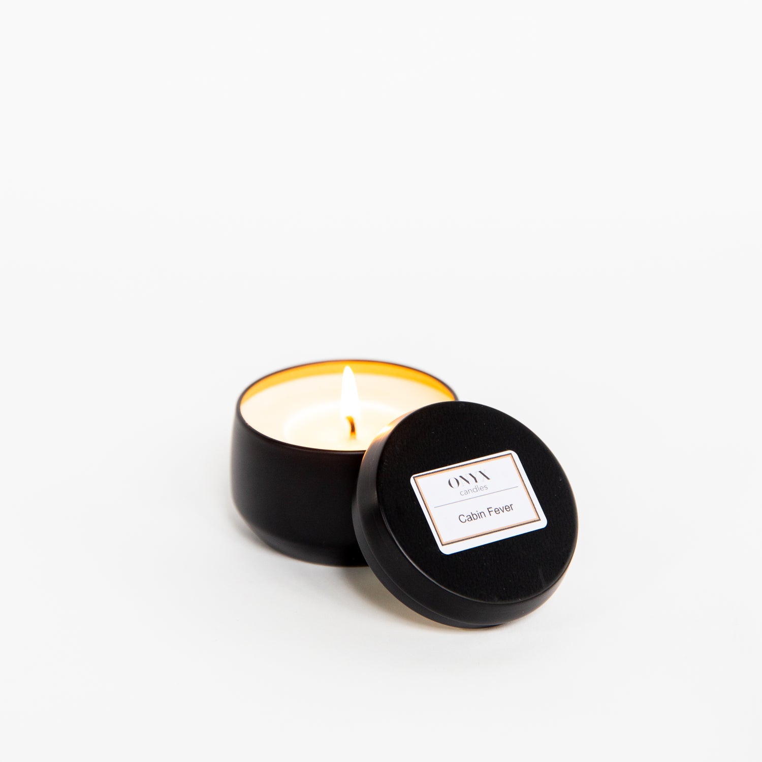 Onyx candles 4 oz matte black tin candle burns brightly, scented in Cabin Fever