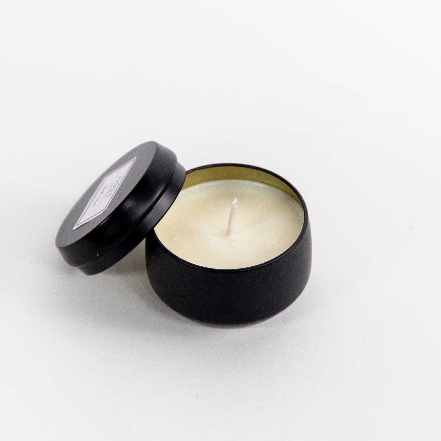 4 oz matte black tin option for the Self Care scented candle