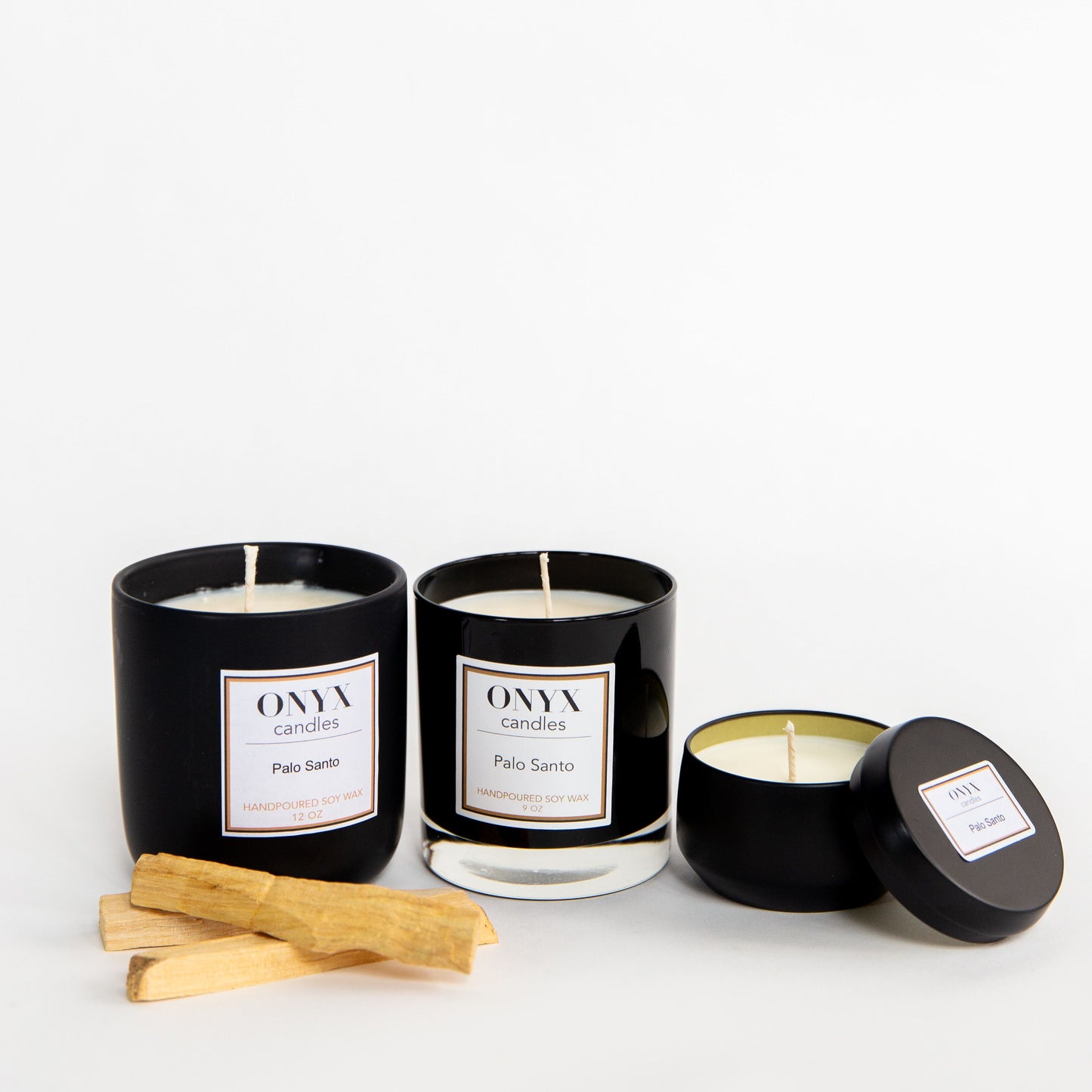 Palo Santo scented candle collection by Onyx Candles. Shown here are three variants, from let to right we have the 12oz matte black ceramic jar, the 9oz black glass jar, and the 4oz matte black size varieties