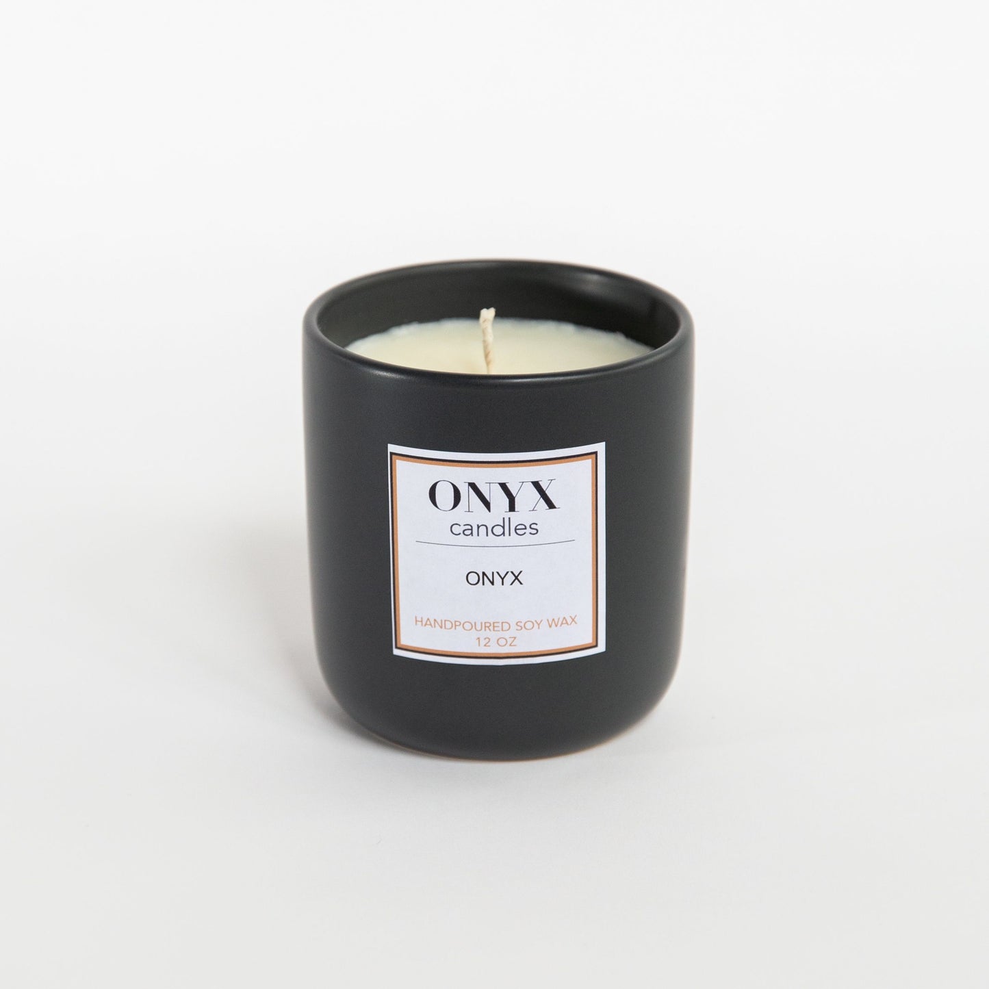 12oz matte black ceramic jar in Onyx signature scent